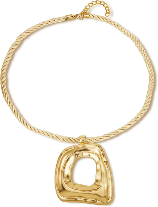 Sienna Sculptural Pendant gold-tone abstract pendant necklace